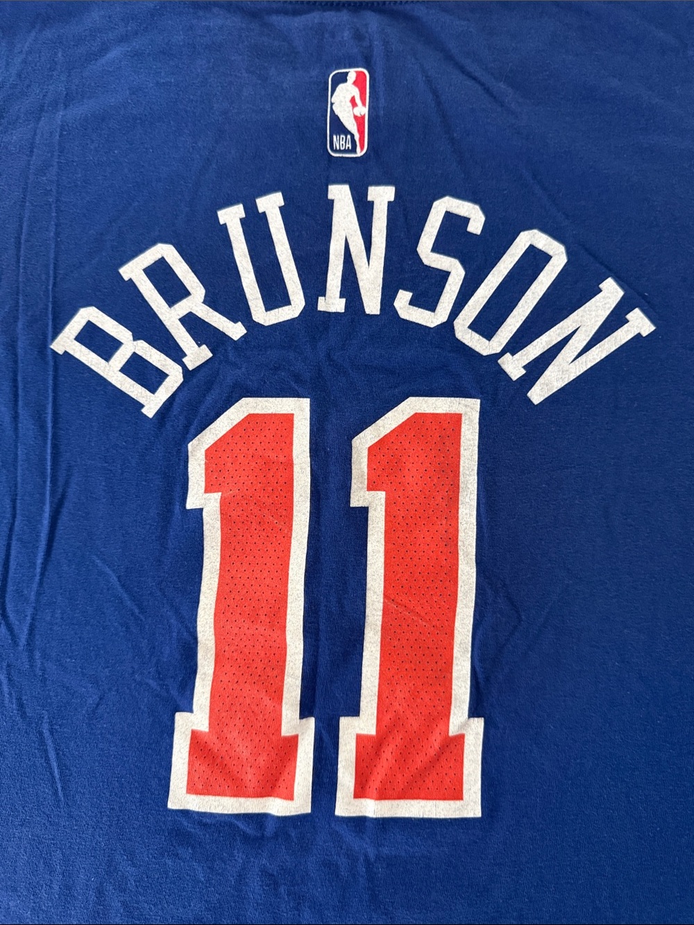 NEW YORK KNICKS MVP BRUNSON “11”Nike Blue Graphic Tee with Orange Accents L14-16